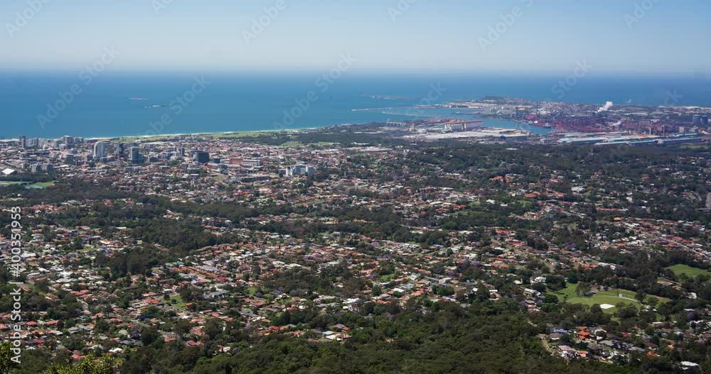 timelapse of industrial coast city with power plant burning smoke in the background and a port with ships moving in and out timelapse of industrial coast city with power plant burning smoke in the background and a port with ships moving in and out