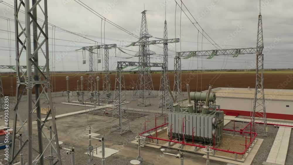 Construction site of a power station, structures and power lines, 4k Construction site of a power station, structures and power lines, 4k