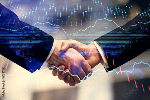 Double exposure of forex graph hologram and handshake of two men. Stock market concept.