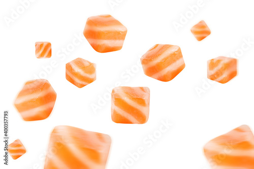 Fresh salmon cubes of red fish ingredient for sushi or salad salmon Clipping Path on white isolated .Image stack Full depth of field macro