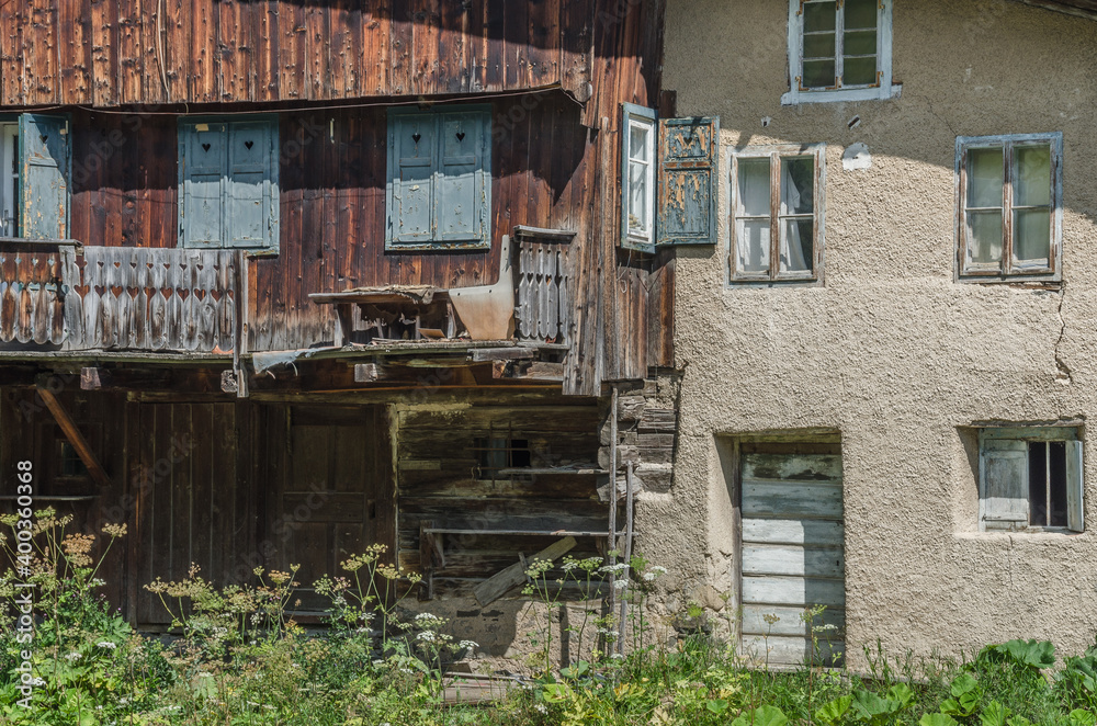 An old, deteriorating and abandoned house in Selva village, Gardena valley, Dolomites, South Tirol, Italy. An old, deteriorating and abandoned house in Selva village, Gardena valley, Dolomites, South Tirol, Italy.