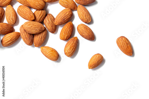 Almonds floating pieces on white isolated .almond  Image stack Full depth of field macro shot
