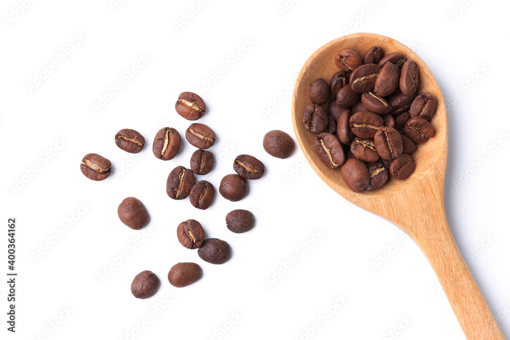 Obraz premium top coffee beans roast lMedium coffee drink energy in spoon wood on white isolated