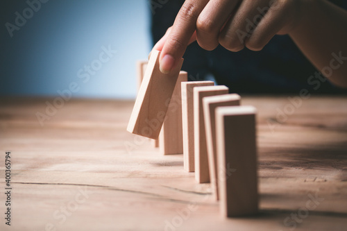 Man hand pick one wood block from many wood block to business concept in choose idea person from many candidate and different Select resources Of the best and most outstanding companies