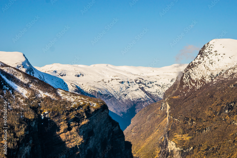 Snowy mountains landscape and clear sky
