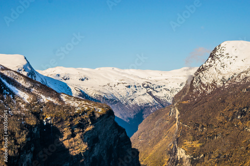Snowy mountains landscape and clear sky