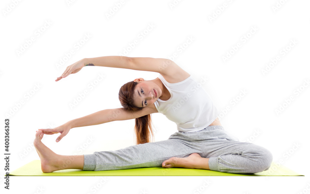 Caucasian woman practicing yoga concept of healthy life and natural balance between body and mental development on white background Caucasian woman practicing yoga concept of healthy life and natural balance between body and mental development on white background