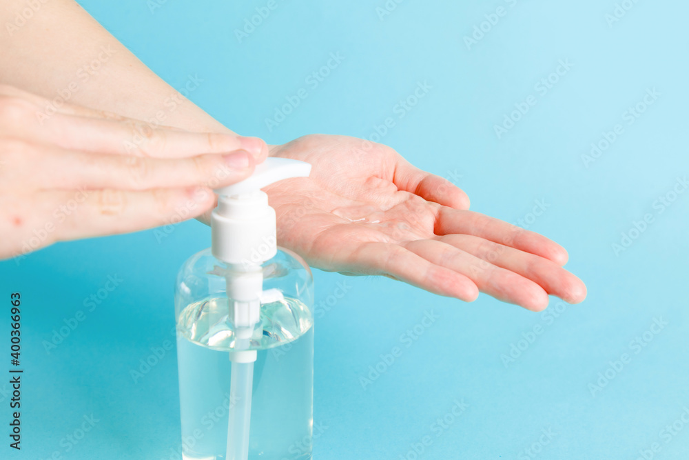 bottle alcohol clean with hand sanitiser liquid bottle . concenpt protection sanitiser tool protect corona virus on turqouise isolated background bottle alcohol clean with hand sanitiser liquid bottle . concenpt protection sanitiser tool protect corona virus on turqouise isolated background
