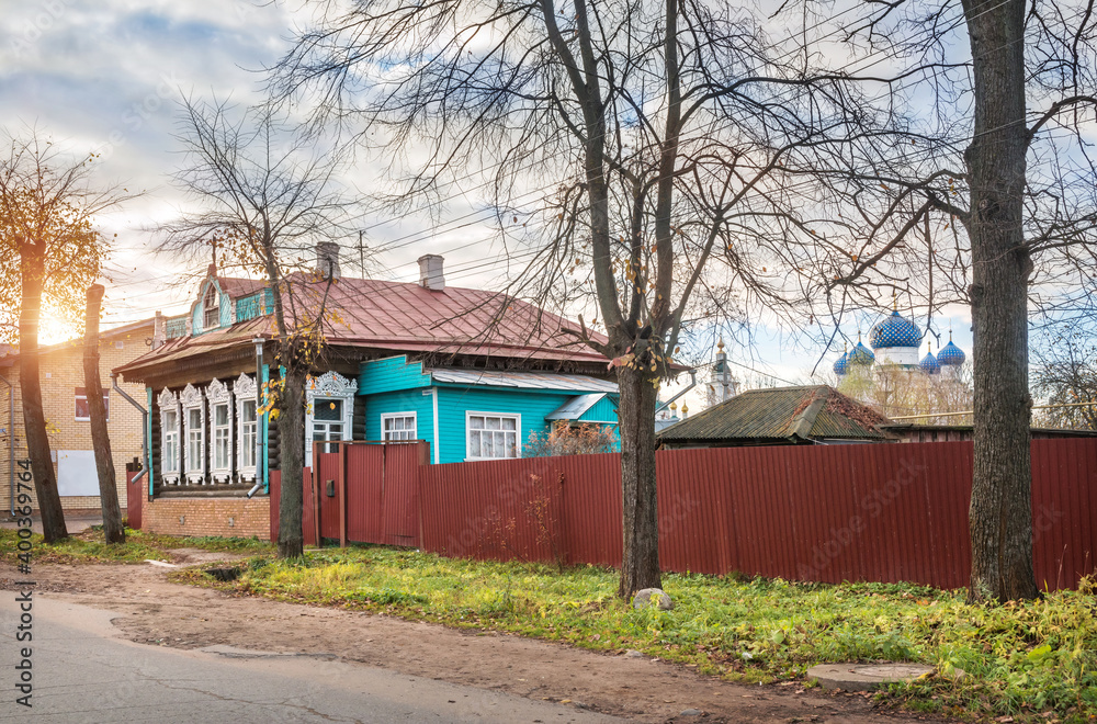 Wooden house with openwork platbands in Uglich