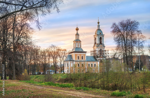 Kazan church with a bell tower in Uglich among trees