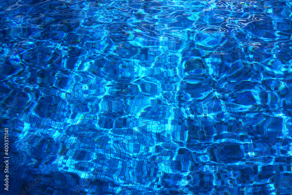 Swimming Pool Surface With Light Reflection and Water Ripple Patterns