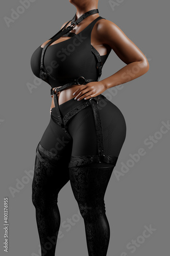 Sensual woman in black latex costume and leather straps