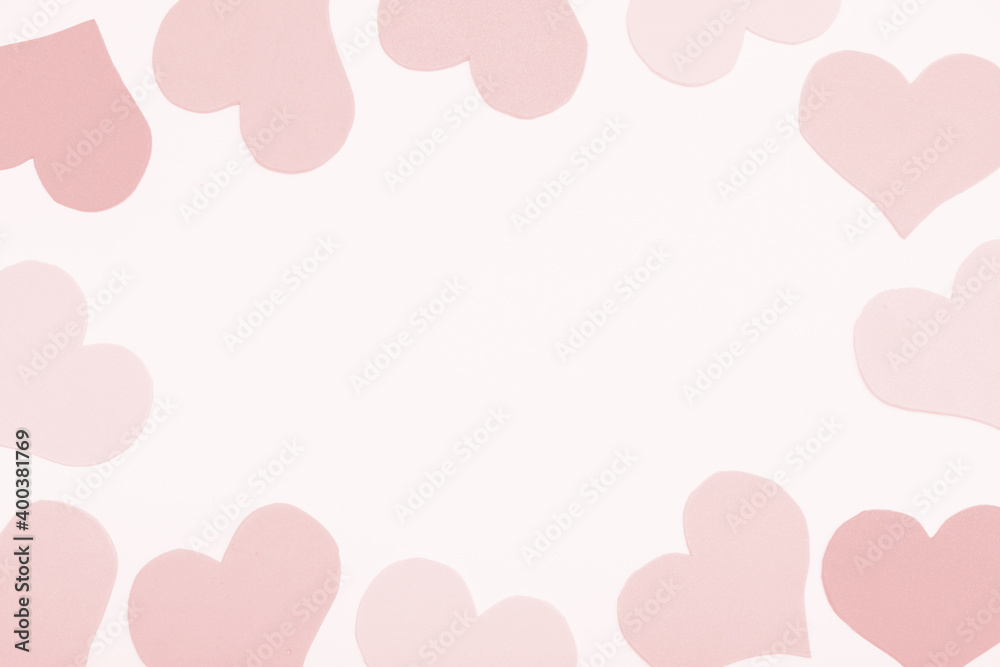 Paper pink background, frame from hearts, copy space.