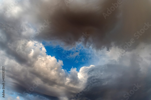 Dramatic panoramic skyscape with the dark stormy clouds