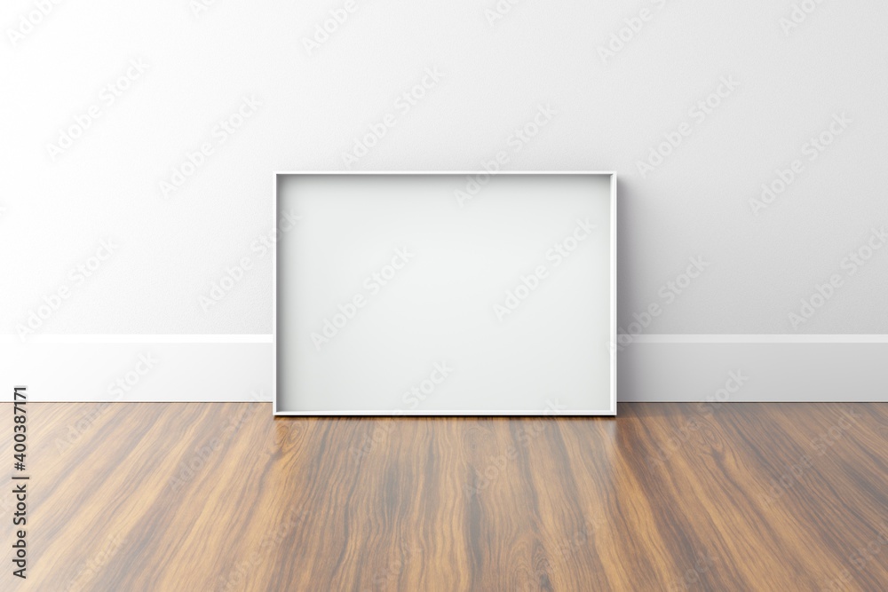 Metal Blank A4 frame on white wall. Wooden floor Metal Blank A4 frame on white wall. Wooden floor