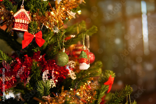 Christmas tree close up with bokeh of light background, happy new year interior for celebration 