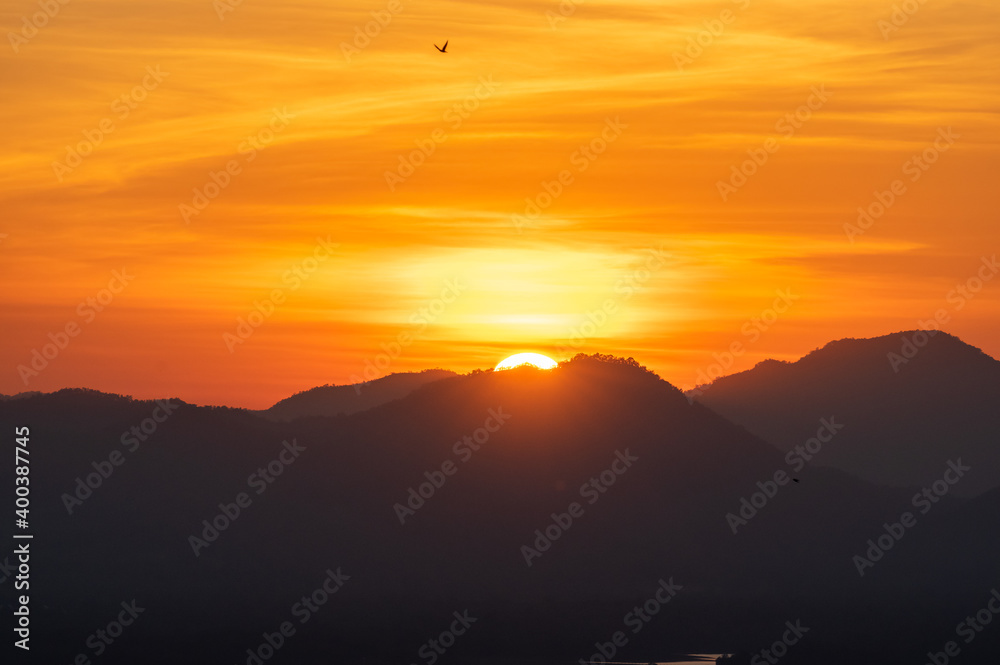 Obraz premium Sunset over mountains.