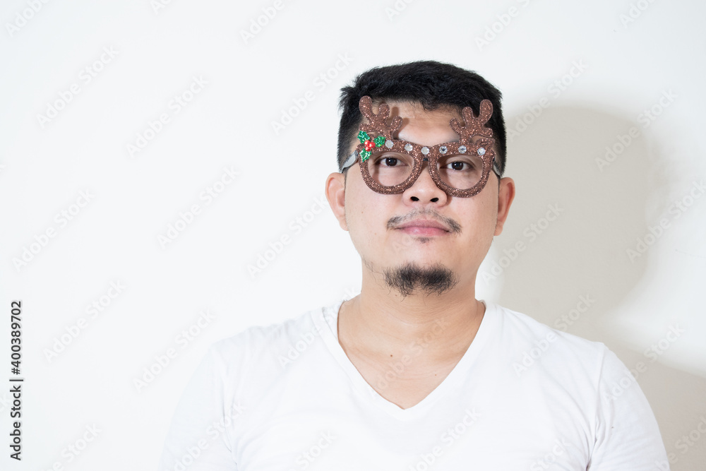 Handsome boy wearing fancy glasses During the Christmas season
New Year's fun ideas