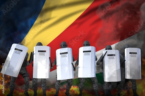 Billede på lærred Seychelles protest fighting concept, police guards protecting order against muti