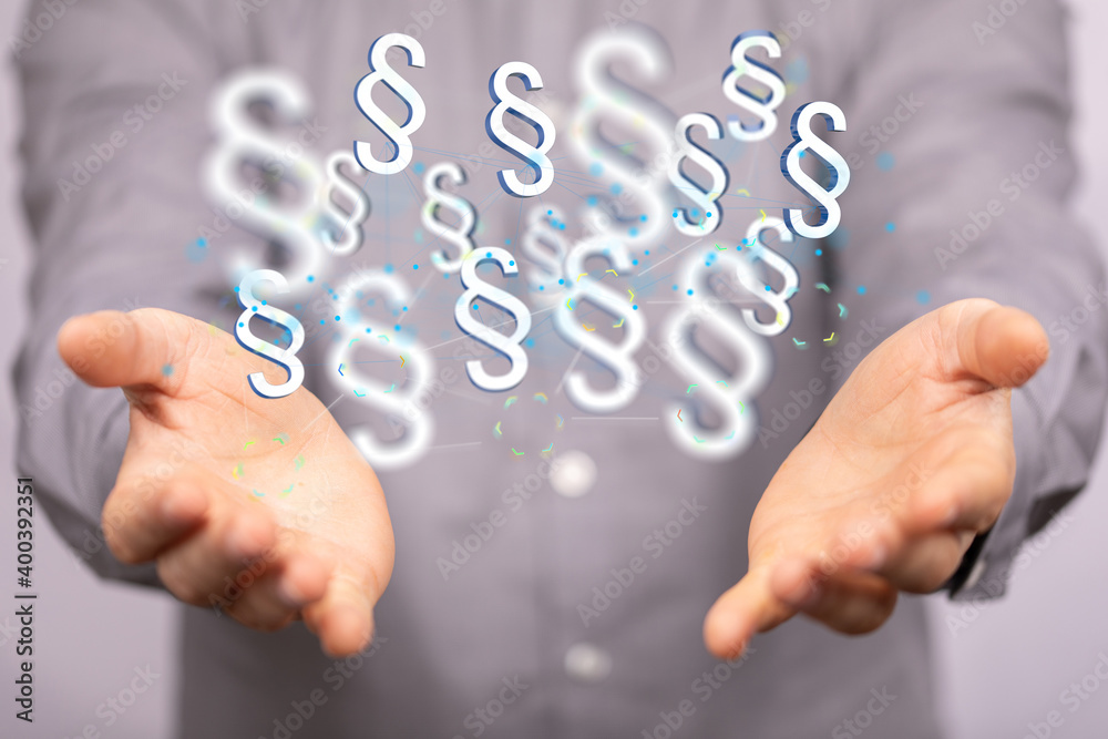 Fototapeta premium Businessman using 3D rendering digital paragraph law symbol