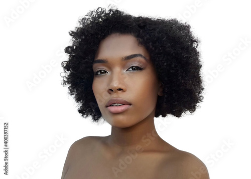 Beauty portrait of an elegant African American woman with beautiful curly hair, radiant healthy clear skin on white background, isolated