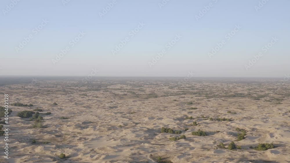 Desert at sunset. Flight over the desert in the reserve Desert at sunset. Flight over the desert in the reserve