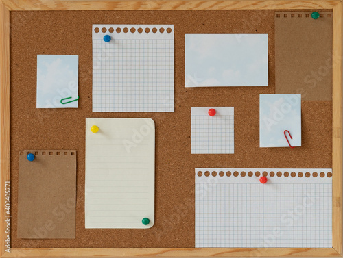 cork board with blank papers wooden frame. notes. colourful pin and paperclips . reminder.  pin board. isolated. new year's resolution, goals. 