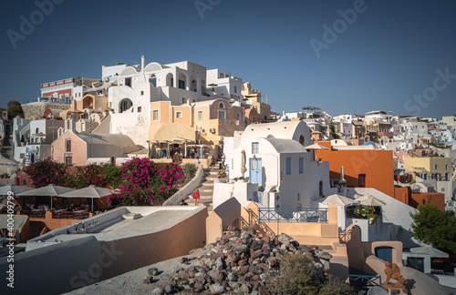 Greece Traveling. View of Greek Traditional Colorful Houses and Windmills of Oia or Ia at Santorini Island in Greece