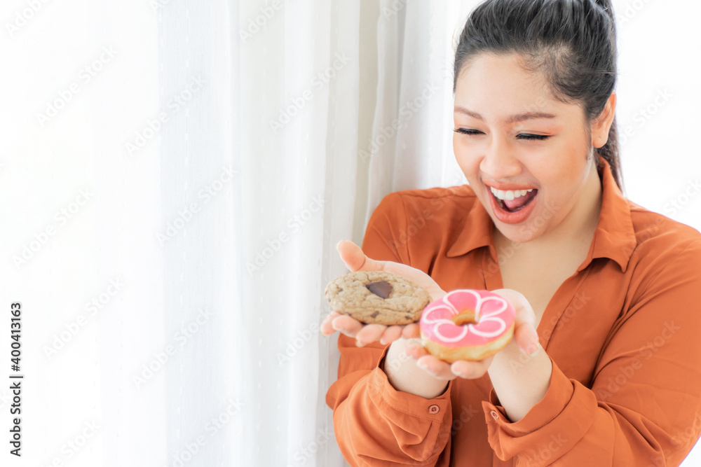 Portrait beautiful plump young woman joy of eating Junk food Sweet treat cake and cookie reason why you are fat - lifestyle Woman diet weight loss overweigh Portrait beautiful plump young woman joy of eating Junk food Sweet treat cake and cookie reason why you are fat - lifestyle Woman diet weight loss overweigh