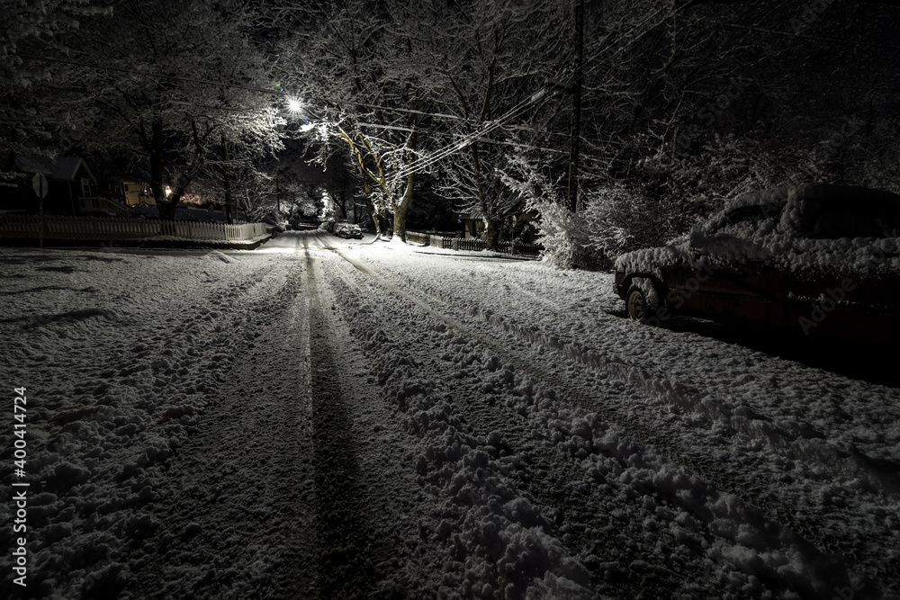 Down the Road in a Snowy and Cold Winter Night