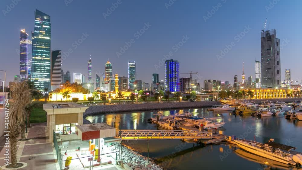 Yachts and boats at the Sharq Marina with city skyline day to night transition timelapse hyperlapse in Kuwait. Kuwait City, Middle East. View from bridge Yachts and boats at the Sharq Marina with city skyline day to night transition timelapse hyperlapse in Kuwait. Kuwait City, Middle East. View from bridge