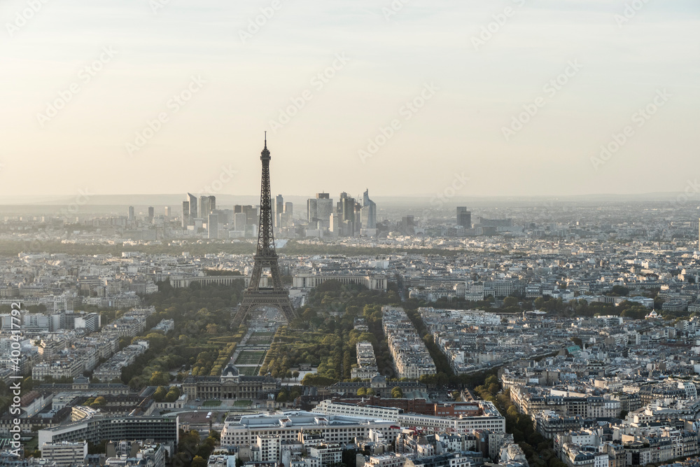 Aerial view of Paris at sunset with the Eiffel tower in background