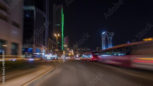 Drive on streets through the traffic in the city highway timelapse hyperlapse drivelapse in Kuwait. Kuwait, Middle East photo