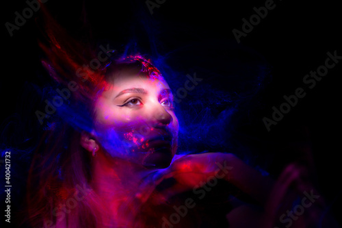 Lucid Dreaming series. Backdrop of human face and colorful fractal clouds on the subject of dreams, mind, spirituality, imagination and inner world © SergeyKatyshkin