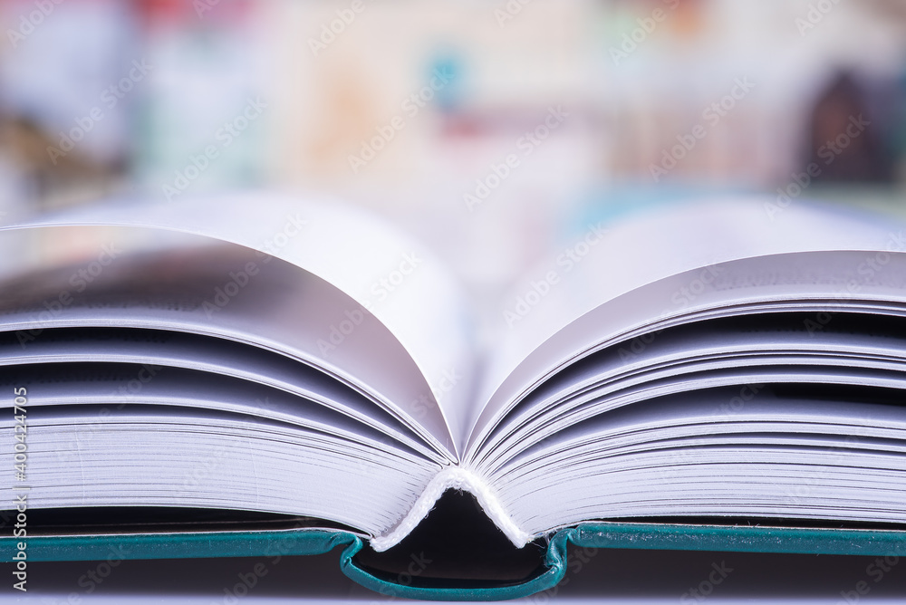 Open book close-up with soft blur background Open book close-up with soft blur background