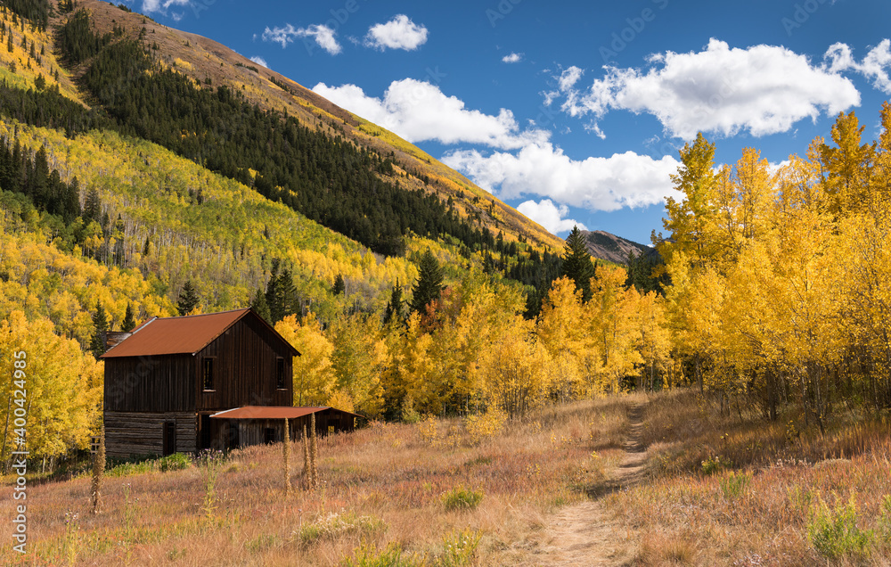 Beautiful aspen trees and high mountains around the Ghost Town of Ashcroft. This restored hotel is on the south end of Ashcroft, which is in the Castle Creek Valley in central Colorado. Beautiful aspen trees and high mountains around the Ghost Town of Ashcroft. This restored hotel is on the south end of Ashcroft, which is in the Castle Creek Valley in central Colorado.