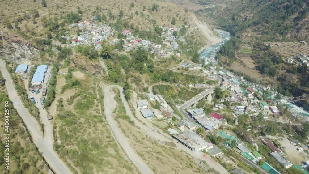 Harsil Village Aerial View in 4K,located on the banks of the Bhagirathi River,a Hindu pilgrimage site in Uttarkashi district and also a Lesser Known Gem in Uttarakhand.Bridge,Picnic,Trekking,Adventure Harsil Village Aerial View in 4K,located on the banks of the Bhagirathi River,a Hindu pilgrimage site in Uttarkashi district and also a Lesser Known Gem in Uttarakhand.Bridge,Picnic,Trekking,Adventure