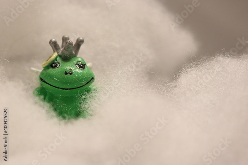 Angel Frog with crown in clouds on desk