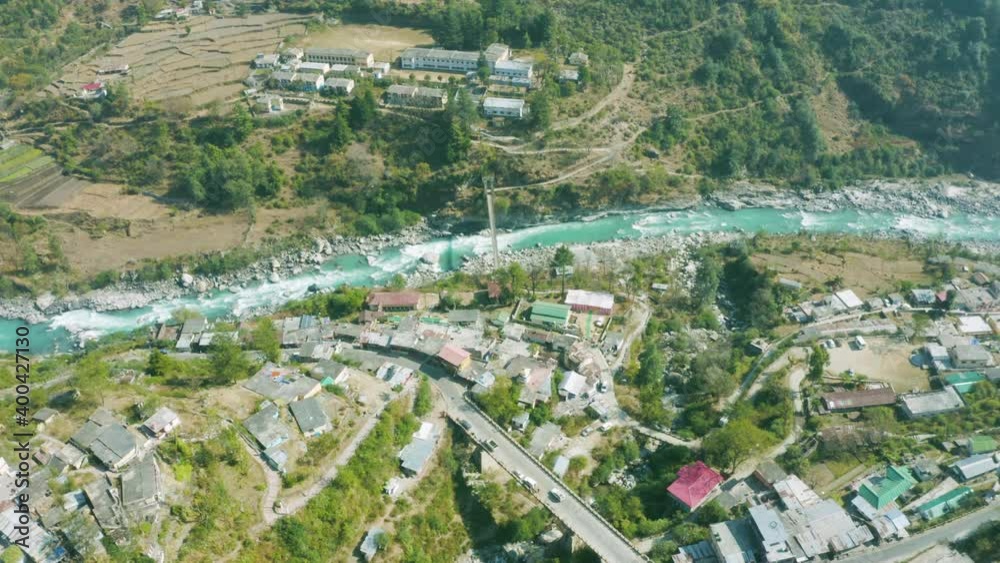 Harsil Village Aerial View in 4K,located on the banks of the Bhagirathi River,a Hindu pilgrimage site in Uttarkashi district and also a Lesser Known Gem in Uttarakhand.Bridge,Picnic,Trekking,Adventure Harsil Village Aerial View in 4K,located on the banks of the Bhagirathi River,a Hindu pilgrimage site in Uttarkashi district and also a Lesser Known Gem in Uttarakhand.Bridge,Picnic,Trekking,Adventure