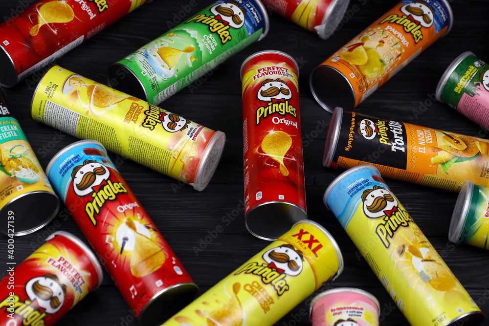 Pringles variety of flavors. Many cardboard tube cans with Pringles