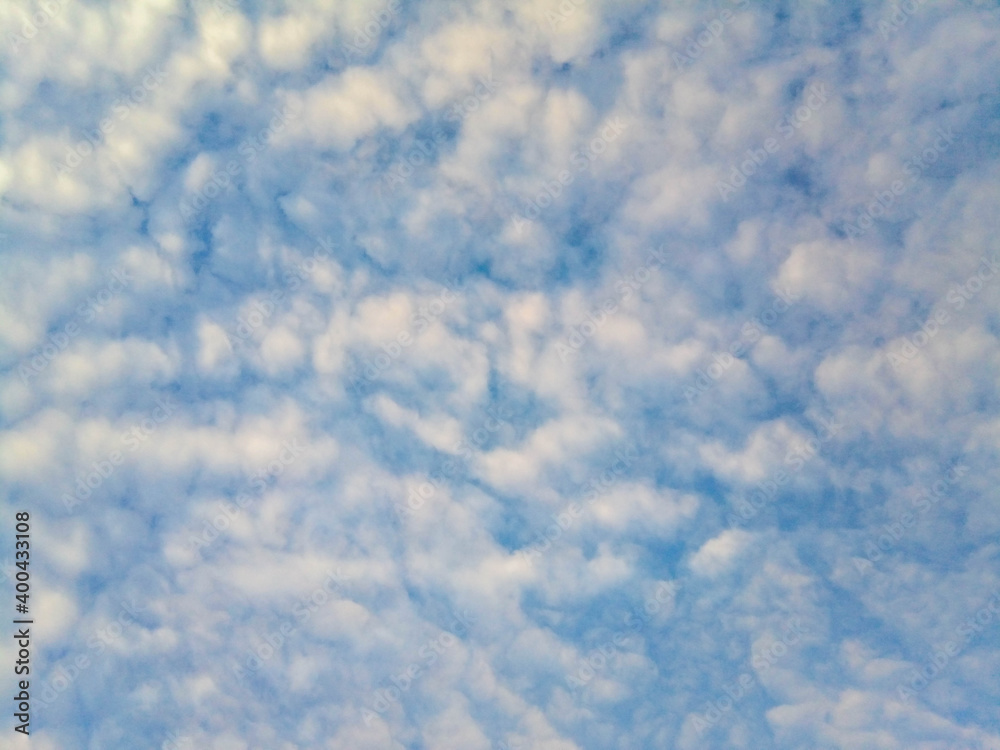 Natural blue sky background with beautiful puffy white clouds Natural blue sky background with beautiful puffy white clouds