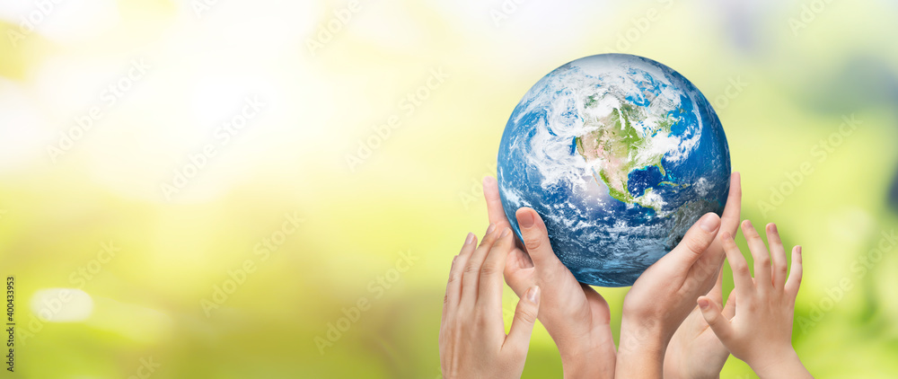 Earth globe in family hands. World environment day Earth globe in family hands. World environment day