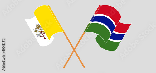 Crossed flags of Vatican and the Gambia