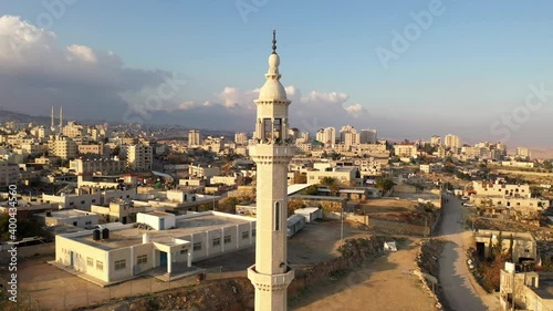 Mosque Tower Minaret in Palestine town, Aerial view
al-eizariya Town mosque minaret with speakers, Israel-palestine
