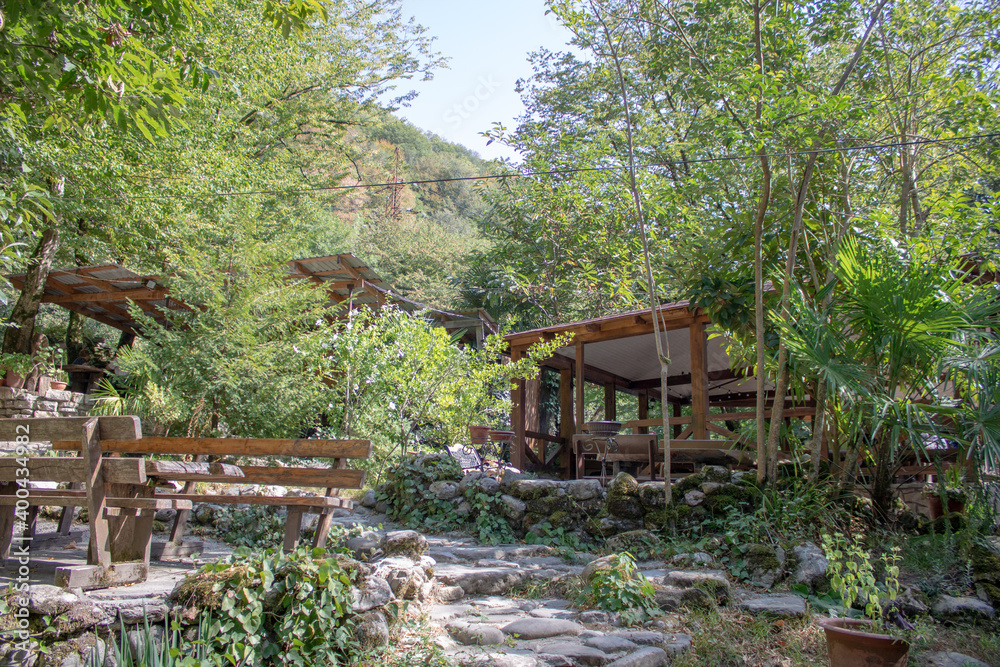 The territory of the republican reserve in the mountains of the Caucasus by the name of Koryto on a hot sunny summer day. The source of healing from loneliness.