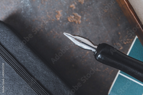 Nib pen on grunge background