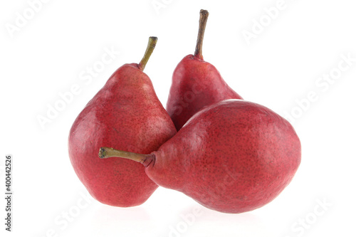 Isolated pears. Three cut red pear fruits isolated on white background