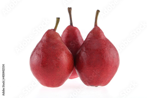 Isolated pears. Three cut red pear fruits isolated on white background