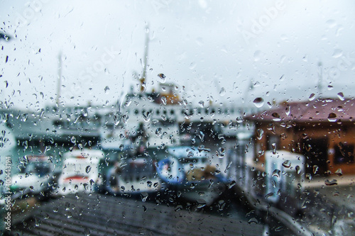 Photography Istanbul passenger ferry view behind window with raindrops
