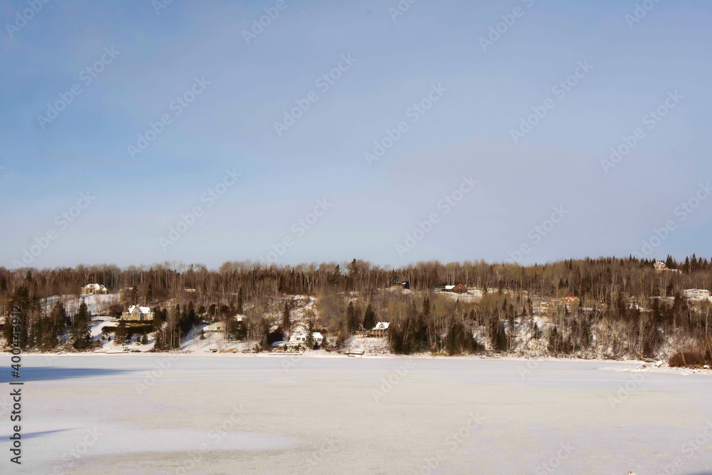 Winter landscape around a lake in Quebec, Canada, in December Winter landscape around a lake in Quebec, Canada, in December